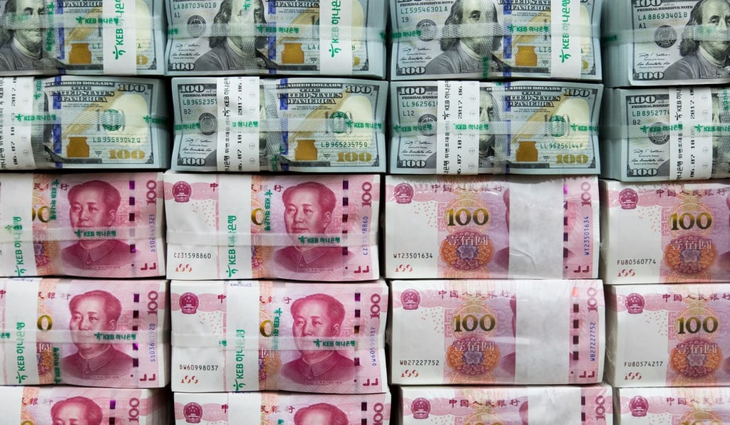 The Chinese yuan has already fallen 9 per cent against the US currency, approaching the psychologically important level of 7 per dollar. Photo: Bloomberg