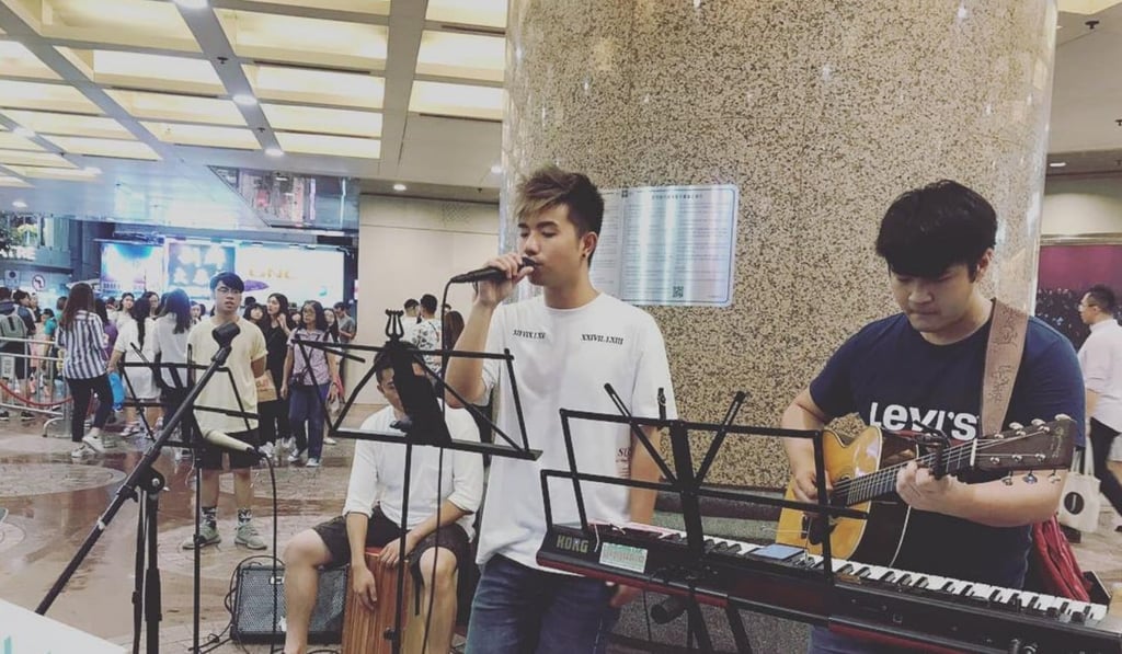 Buskers performing in Times Square before the owners of the mall had them banned. Photo: Instagram