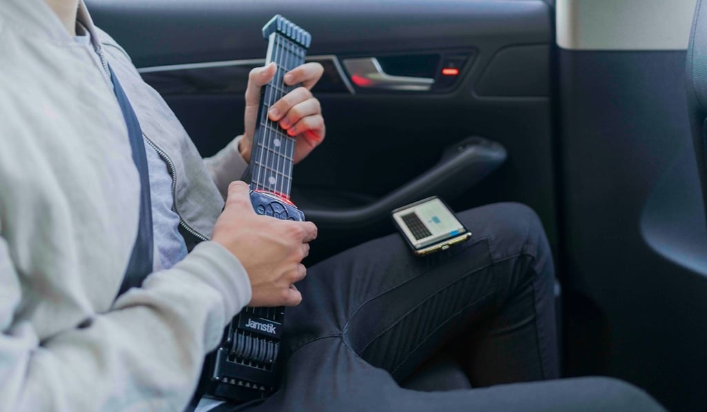 The new seven-fret Jamstik 7 smart guitar, which is built to the same specifications as a normal guitar, but which can be used to create the sounds of almost any instruments you can think of. The new seven-fret Jamstik 7 smart guitar, which is built to the same specifications as a normal guitar, but which can be used to create the sounds of almost any instruments you can think of.