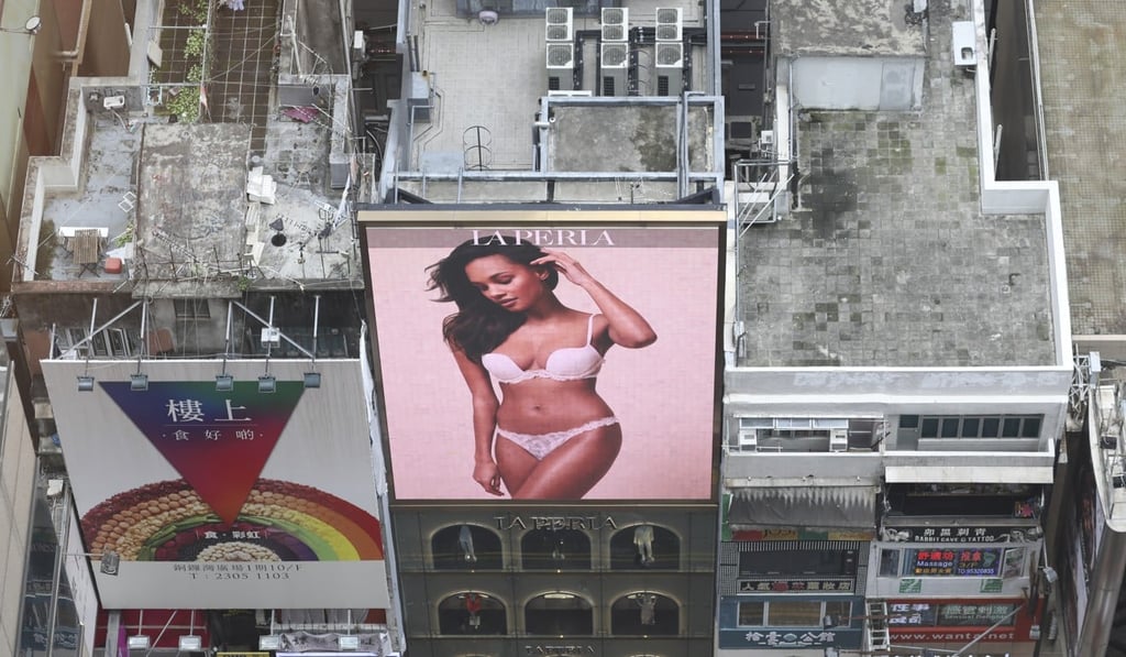 A billboard of a model wearing La Perla brand lingerie in Times Square, Causeway Bay, Hong Kong. Photo: Antony Dickson