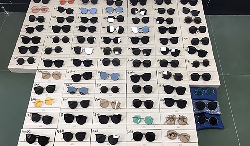 Police confiscated 50 pairs of sunglasses from the couple’s warehouse. Photo: Handout