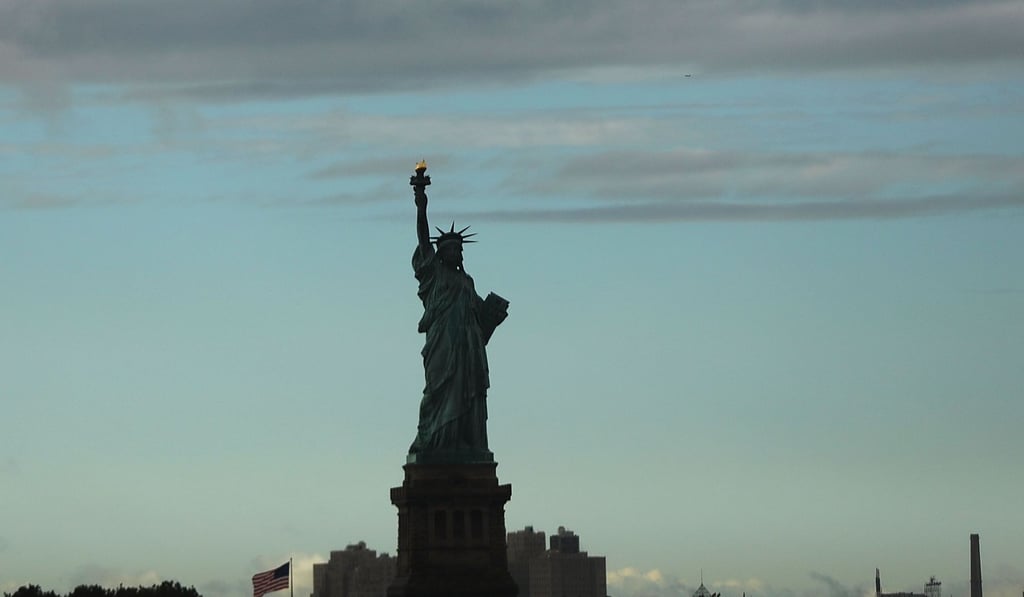 To those in China still envisioning the open hands of the Statue of Liberty, today’s America may be very different. Photo: Getty Images / AFP To those in China still envisioning the open hands of the Statue of Liberty, today’s America may be very different. Photo: Getty Images / AFP