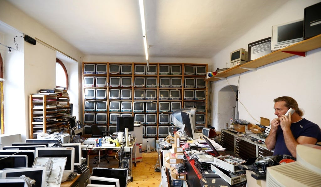 Roland Borsky makes a phone call in his office in Vienna. Photo: Reuters