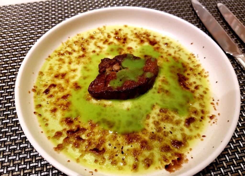 Pan-fried foie gras was paired with a green pea purée crème brûlée.