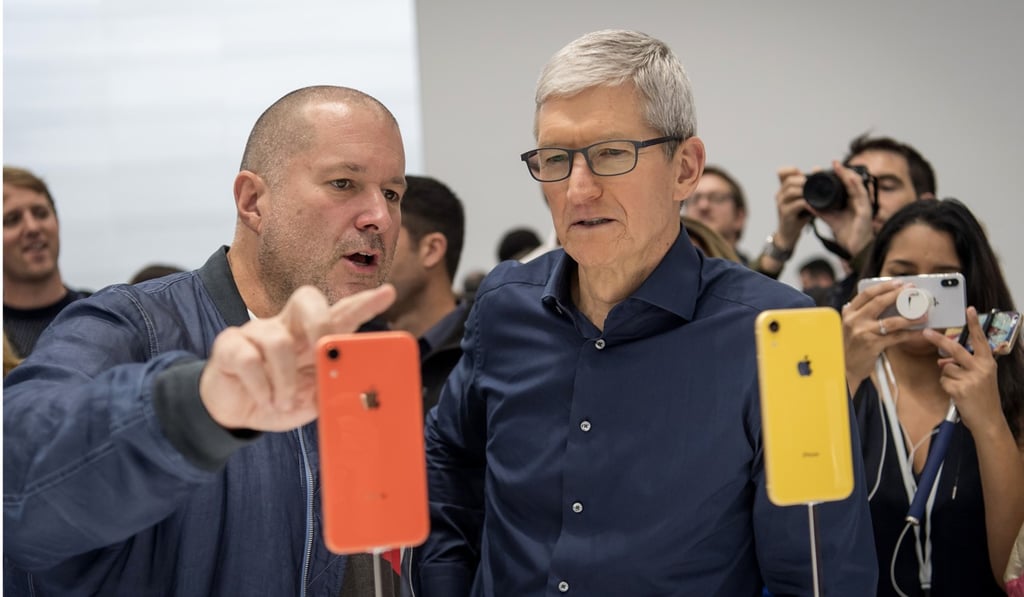 File photo of Jony Ive, chief design officer for Apple, and Tim Cook looking at some iPhones. Photo: Bloomberg