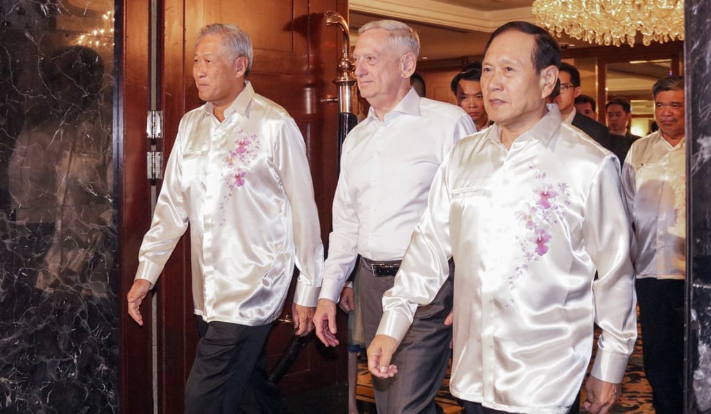 (From left) Singapore’s military chief Ng Eng Hen, James Mattis and Wei Fenghe attend a gala dinner at the Asean defence ministers’ meeting in Singapore on Friday. Photo: AP