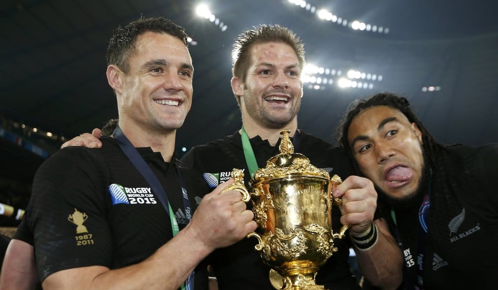 Richie McCaw of New Zealand (centre), Dan Carter (left) and Ma’a Nonu lift the World Cup for the second time. New Zealand are one of four teams to win the World Cup. Photo: Reuters