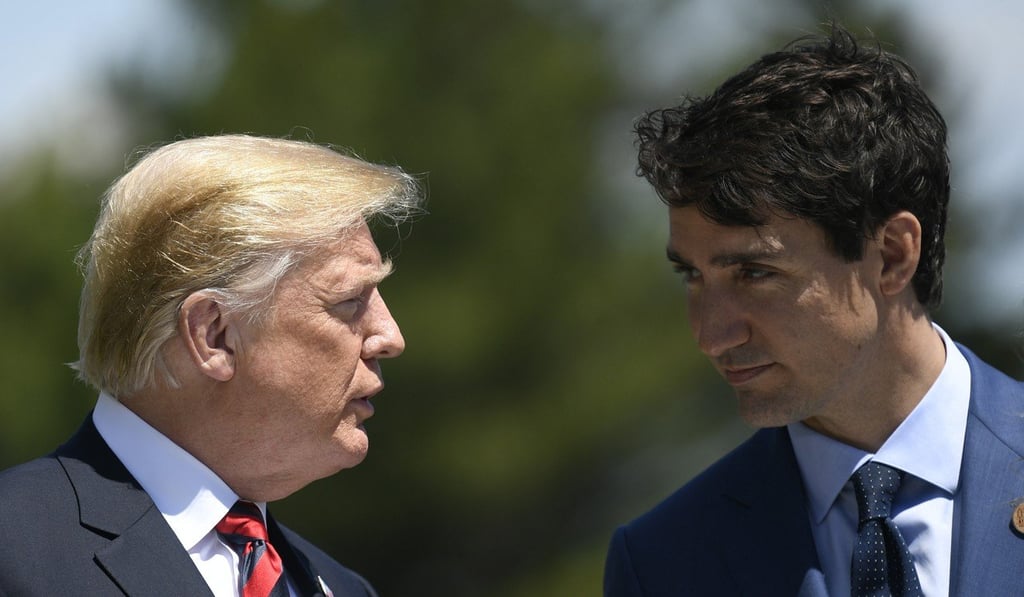 US President Donald Trump with Canadian Prime Minister Justin Trudeau. Photo: EPA