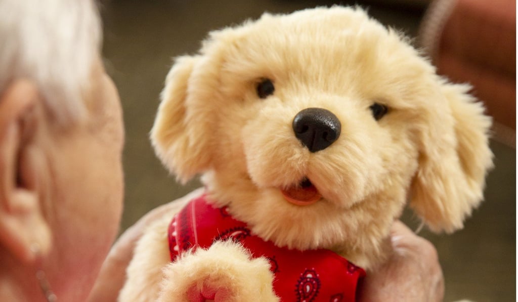 Hasbro’s Joy for All robotic puppy, which features technology that enables it to look at the person speaking to it.