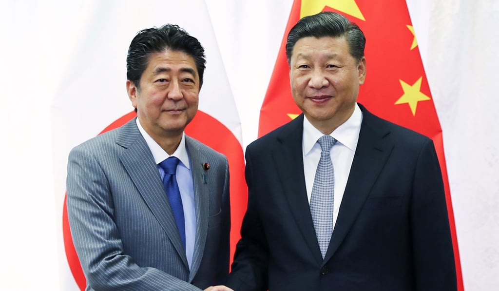 Japanese Prime Minister Shinzo Abe and Chinese President Xi Jinping meet on the sidelines of the Eastern Economic Forum in Vladivostok, Russia. Photo: AP