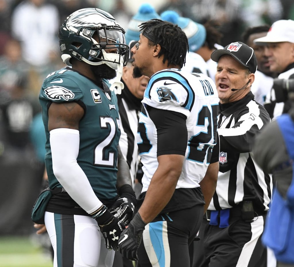 Philadelphia Eagles’ Malcolm Jenkins (left) bickers with Carolina Panthers’ Eric Reid. Photo: TNS