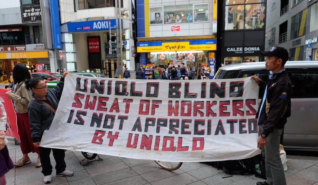 Warni Lena Napitupulu and Tedy Senadi Putra are among a group of Indonesian factory workers demanding Uniqlo take responsibility for unpaid wages. Photo: Handout