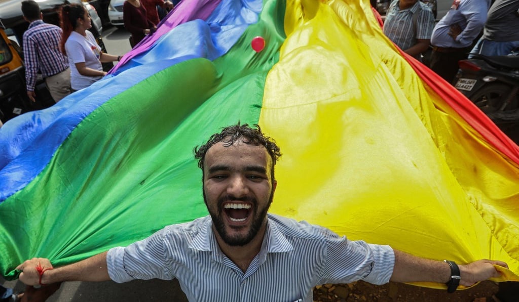 LGBT activists celebrate after the Supreme Court of India ruled that gay sex was no longer a criminal offence, repealing a colonial-era law, in Mumbai on September 6. Photo: EPA-EFE LGBT activists celebrate after the Supreme Court of India ruled that gay sex was no longer a criminal offence, repealing a colonial-era law, in Mumbai on September 6. Photo: EPA-EFE