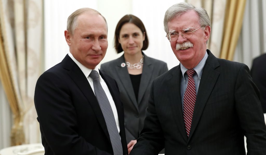 Russian President Vladimir Putin with US National Security Adviser John Bolton in the Kremlin in Moscow, Russia on October 23, 2018. Photo: EPA Russian President Vladimir Putin with US National Security Adviser John Bolton in the Kremlin in Moscow, Russia on October 23, 2018. Photo: EPA