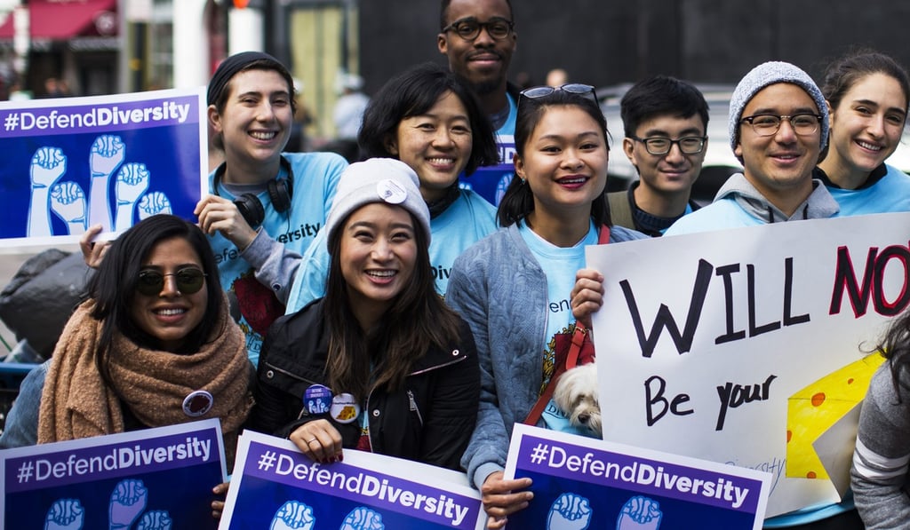 Demonstrators supporting Harvard University’s admission process rally outside the Massachusetts Bay Transportation Authority’s Harvard station in Cambridge, Massachusetts, on October 14. Photo: Bloomberg