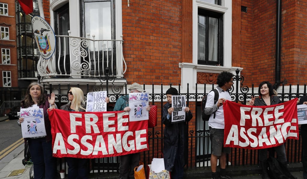 In this file photo taken on May 19, 2017, supporters of Julian Assange stand outside the Ecuadorean embassy in London after Assange addressed reporters from the balcony. Photo: AFP In this file photo taken on May 19, 2017, supporters of Julian Assange stand outside the Ecuadorean embassy in London after Assange addressed reporters from the balcony. Photo: AFP