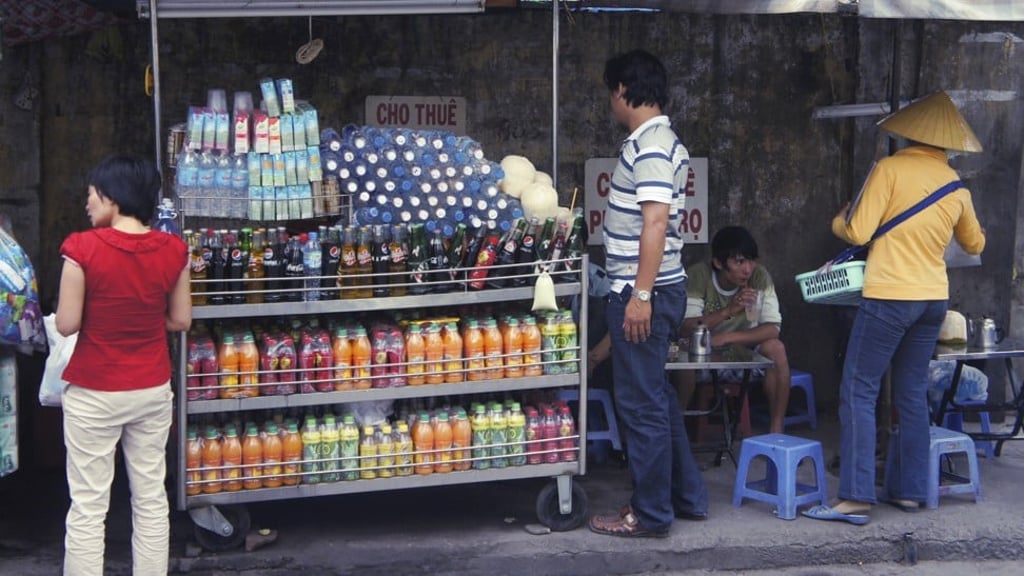 Drink stall on a roadside with drinks by the Tan Hiep Phat Beverage Group. Photo: Shutterstock