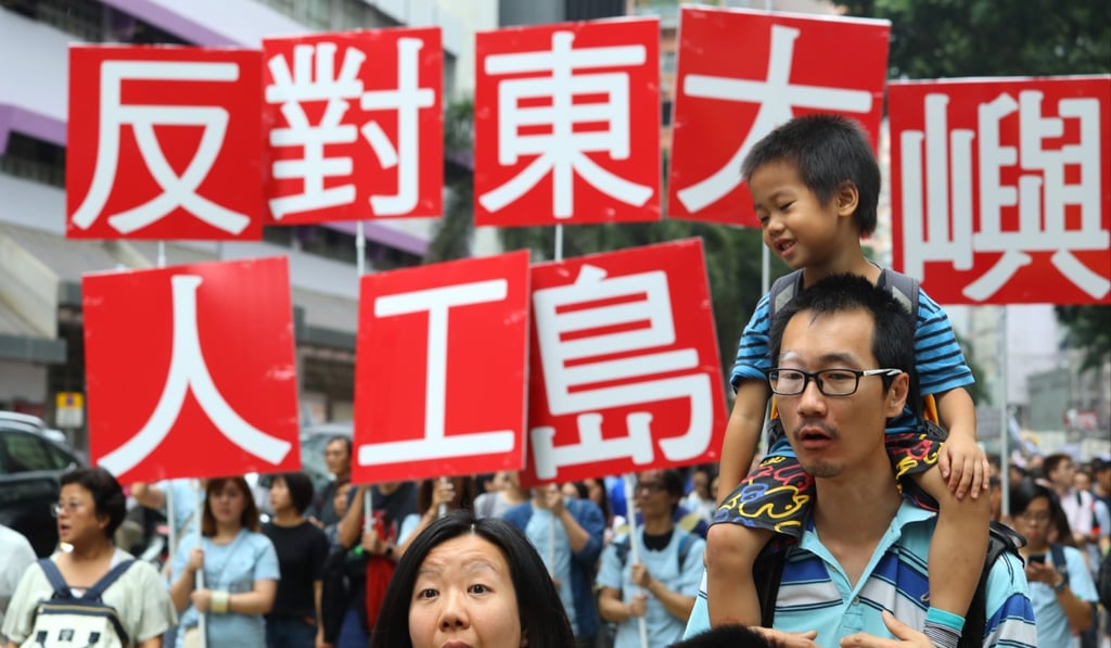 A family marching on October 14 against Hong Kong Chief Executive Carrie Lam’s proposal to build artificial islands to address housing needs in the city. Photo: Edmond So
