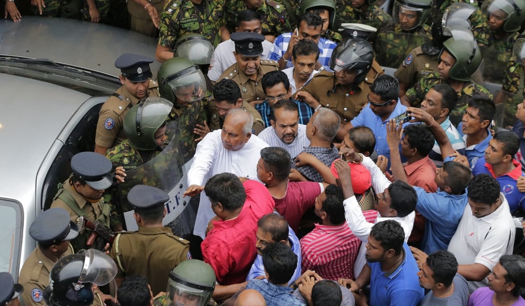 Sri Lankan security forces are deployed near the petroleum ministry building in Colombo. Photo: AP Photo