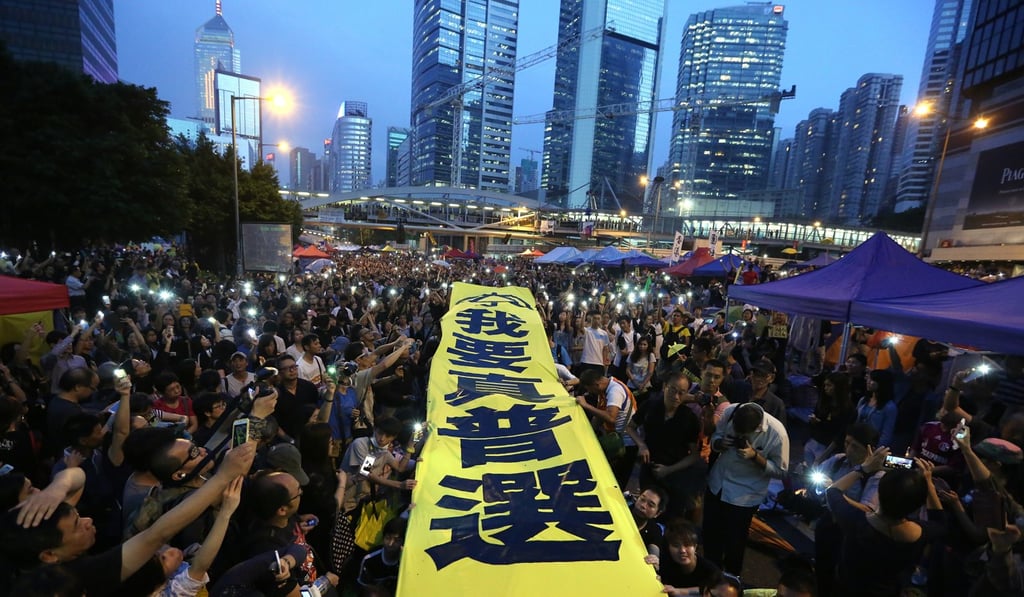Occupy co-leader Chan Kin-man ran towards the fight as others fled, but ...