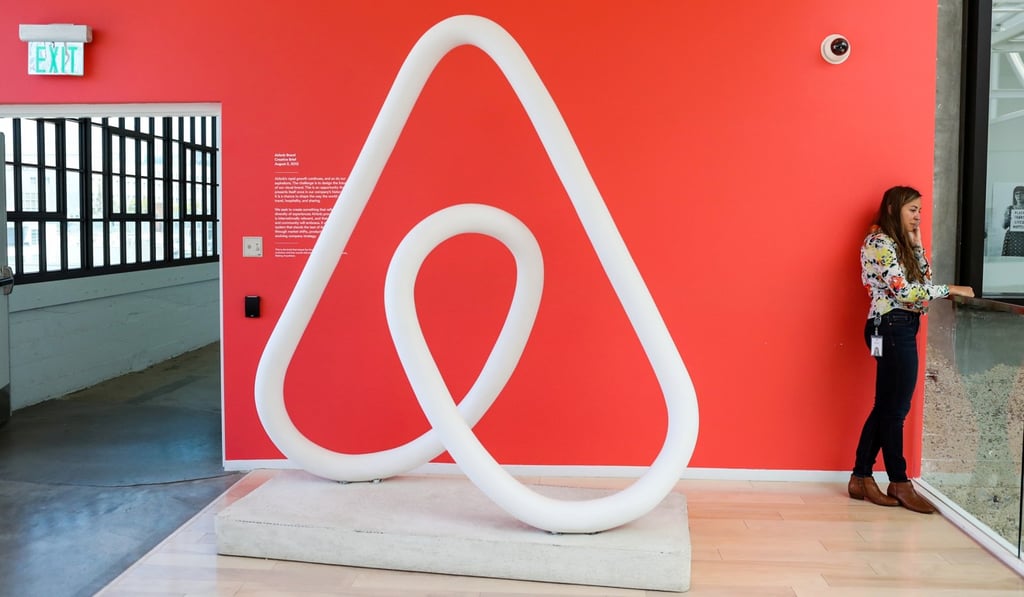 A woman talks on the phone at the Airbnb office headquarters in San Francisco in August 2016. Much of Airbnb’s value lies in intangible assets such as its network of housing hosts, which it combines with technologies, such as computers and smartphones. Photo: Reuters