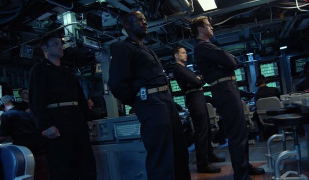 Gerard Butler, right, is Captain Joe Glass, who takes his nuclear submarine on a fast ascent in ‘Hunter Killer’. Photo: Lionsgate