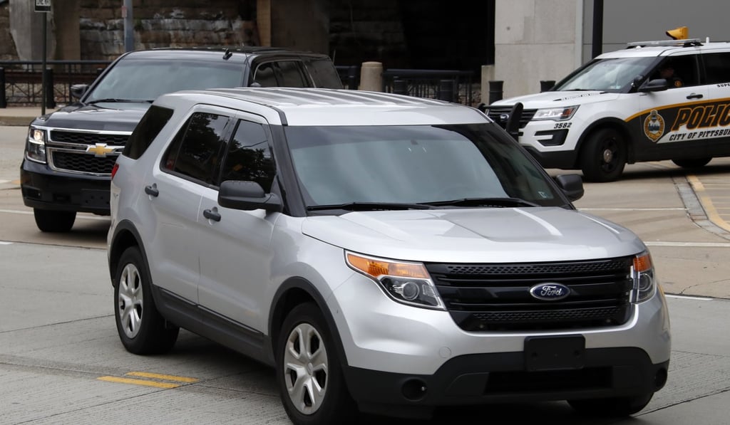 SUVs carrying Robert Bowers leave a Federal Courthouse in Pittsburgh after Robert Bowers's brief appearance on Monday. Photo: AP
