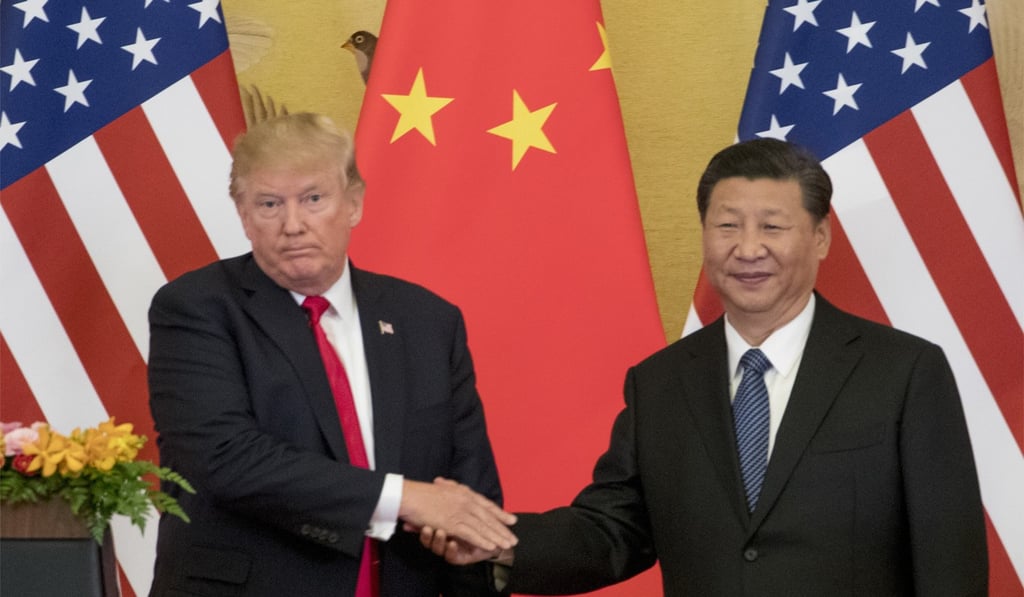In this November 9, 2017 file photo, US President Donald Trump and Chinese President Xi Jinping shake hands in the Great Hall of the People in Beijing. Photo: AP In this November 9, 2017 file photo, US President Donald Trump and Chinese President Xi Jinping shake hands in the Great Hall of the People in Beijing. Photo: AP