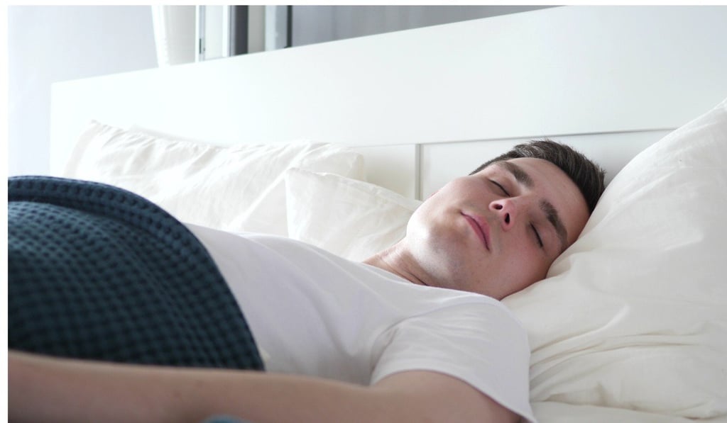Sleeping on your back puts extra pressure on your spine, so you should try to counteract this by placing a couple of pillows under your knees. Photo: Shutterstock Sleeping on your back puts extra pressure on your spine, so you should try to counteract this by placing a couple of pillows under your knees. Photo: Shutterstock