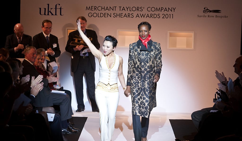 Quan Yingmei winning the Golden Shears Award, the ‘Oscars’ in tailoring, in 2011 Quan Yingmei winning the Golden Shears Award, the ‘Oscars’ in tailoring, in 2011