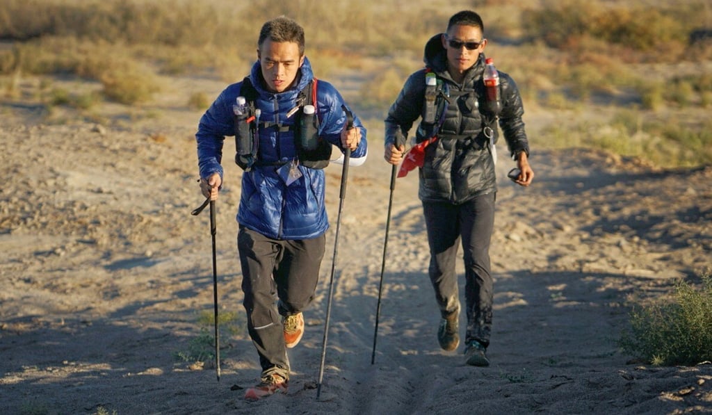 Liang Jing battles Zhao Jiaju on the Ultra Gobi. Photo: Lloyd Belcher Visuals
