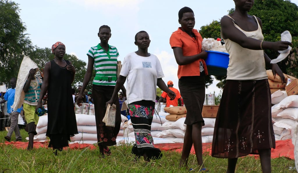 Refugee women from South Sudan queue up for food from the World Food Programme in Palorinya settlement in Moyo district of northern Uganda in October 2017. Photo: Reuters