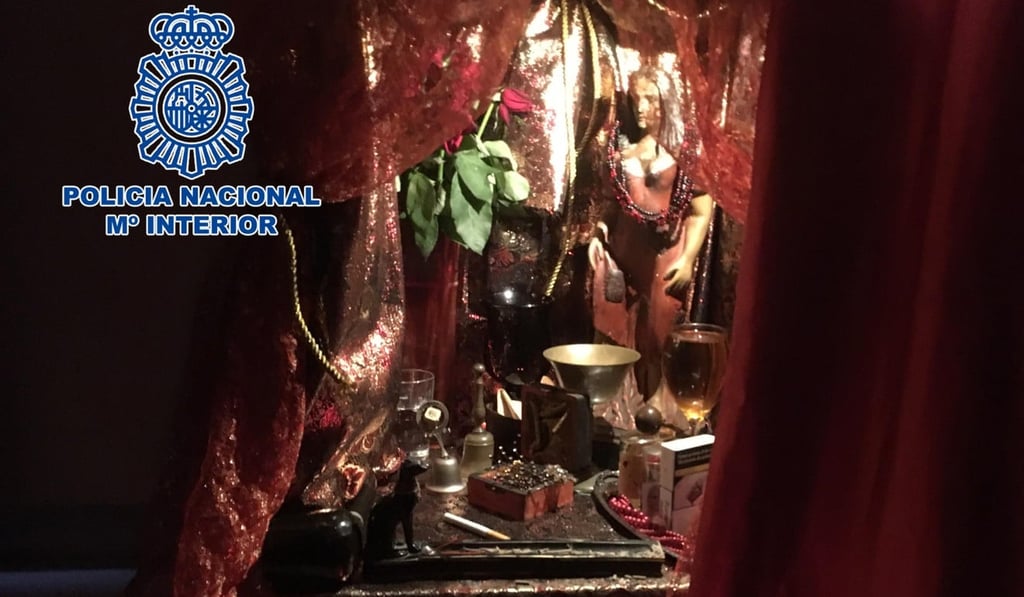 A Santeria altar found during a police rais on a flat in Murcia that was used by a sex trafficking ring. Photo: handout/Spanish National Police/AFP A Santeria altar found during a police rais on a flat in Murcia that was used by a sex trafficking ring. Photo: handout/Spanish National Police/AFP