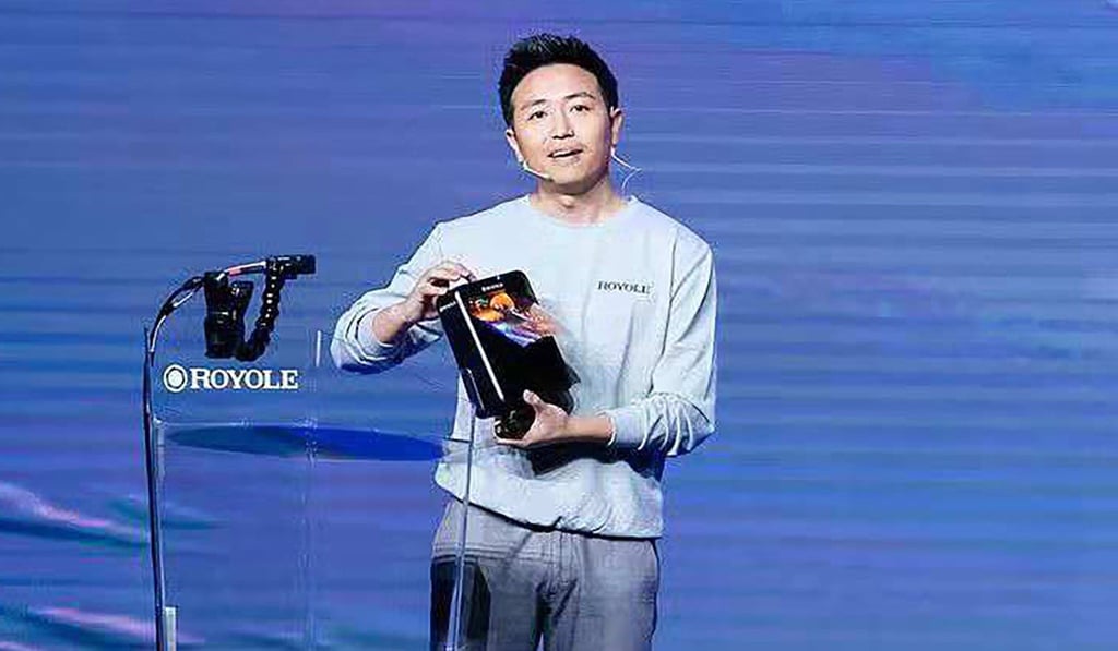 Royole’s co-founder and CEO Bill Liu Zihong showcases the foldable phone during a press conference in Beijing on Wednesday. Photo: Handout. Royole’s co-founder and CEO Bill Liu Zihong showcases the foldable phone during a press conference in Beijing on Wednesday. Photo: Handout.