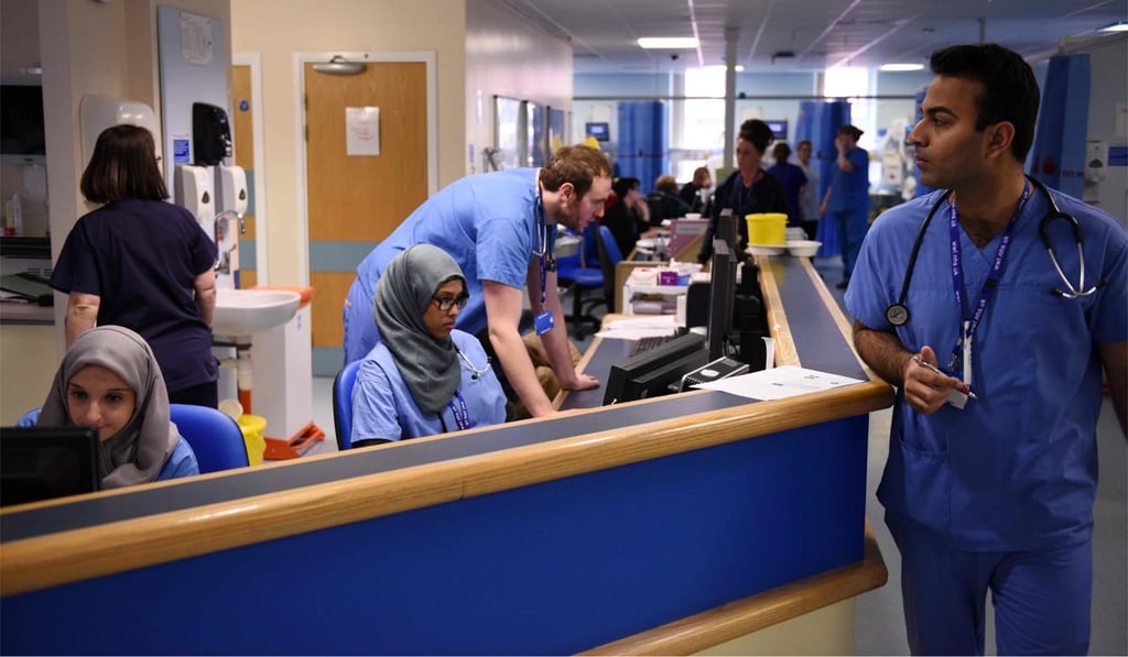 File photo of staff in the accident and emergency department of the Royal Albert Edward Infirmary in Wigan, northwest England. Photo: AFP File photo of staff in the accident and emergency department of the Royal Albert Edward Infirmary in Wigan, northwest England. Photo: AFP