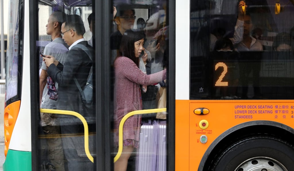 Commuters are squeezed into a bus in Central on October 16. The six-hour MTR service disruption on the day caused overcrowding on other Hong Kong transport services as well. Photo: Sam Tsang