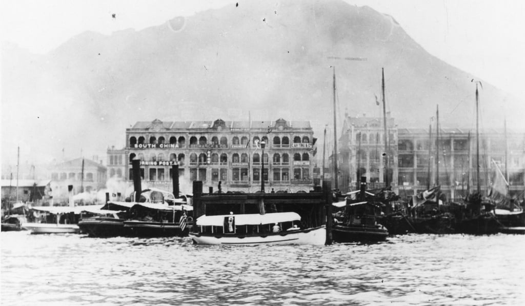 A photo of the Hong Kong waterfront between Connaught Road and Des Voeux Road taken around 1908 showing the South China Morning Post’s first office.