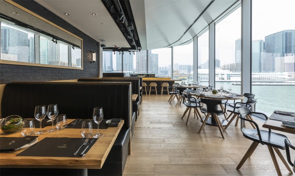 The interior of Artisan de la Truffe, which offers panoramic views across Victoria Harbour. The interior of Artisan de la Truffe, which offers panoramic views across Victoria Harbour.