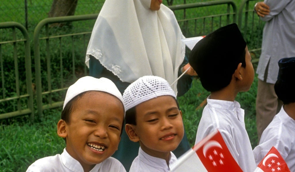 Children in Singapore, ranked third highest for English proficiency among nations and regions where it is not the native language. Photo: Alamy