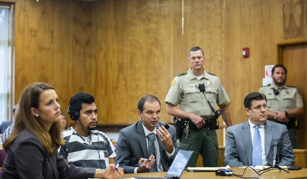 This September 19 file photo shows lawyer Jennifer Frese, murder suspect Cristhian Bahena Rivera, interpreter Steven Rhodes, and Chad Frese, also representing Rivera in the courtroom during Rivera's arraignment in Montezuma, Iowa. Photo: AP This September 19 file photo shows lawyer Jennifer Frese, murder suspect Cristhian Bahena Rivera, interpreter Steven Rhodes, and Chad Frese, also representing Rivera in the courtroom during Rivera's arraignment in Montezuma, Iowa. Photo: AP
