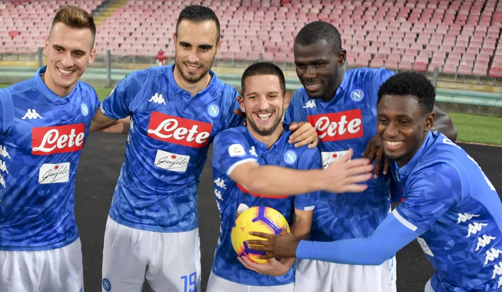 Napoli forward Dries Mertens (centre) poses for pictures with his teammates after setting a new goalscoring record after scoring his 73rd Serie A goal and becoming the topscoring Belgian in the league’s history. Photo: EPA Napoli forward Dries Mertens (centre) poses for pictures with his teammates after setting a new goalscoring record after scoring his 73rd Serie A goal and becoming the topscoring Belgian in the league’s history. Photo: EPA