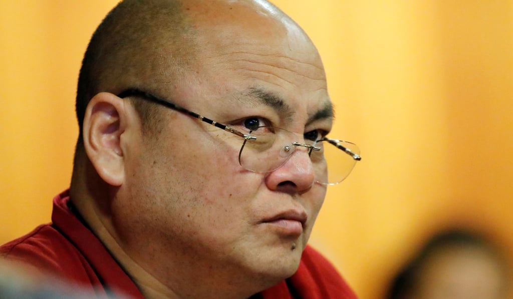 Tibetan monk Golog Jigme spoke at the Geneva forum about three jail terms he served before escaping and gaining political asylum in Switzerland in 2015. Photo: Reuters