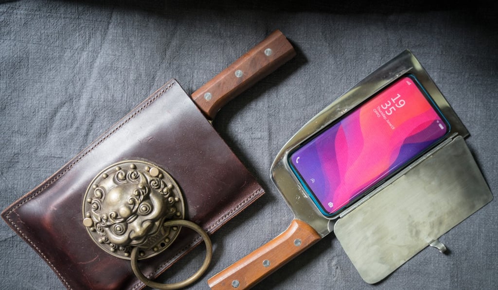 Cellphone cases designed to look like meat cleavers are Shuai's hottest product. He has sold 10. Photo: Washington Post