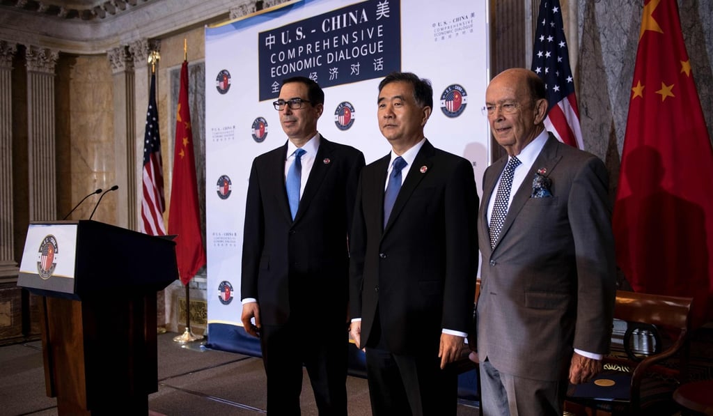 From left: US Treasury Secretary Steven Mnuchin, Chinese Vice-Premier Wang Yang and US Commerce Secretary Wilbur Ross at the US Department of the Treasury, in July. Picture: AFP