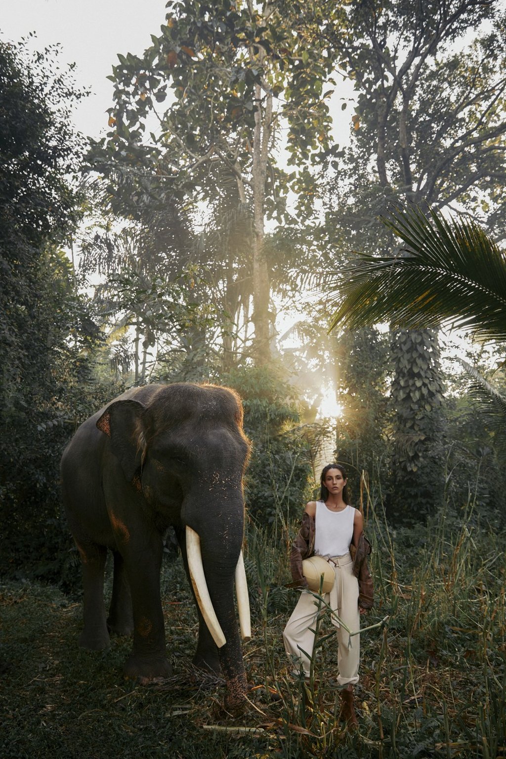 RALPH LAUREN Jacket, HK$7,900 Trousers, HK$1,990 Boots , HK$3,990 ERMENEGILDO ZENGAVest. Price on request DAISY MCBURNEY MILLINERYHat. Price on request