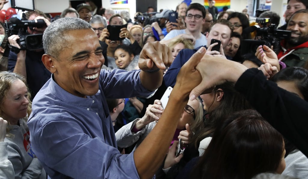 Former US president Barack Obama smiles as he greets Democratic volunteers in a surprise appearance in Fairfax Station, Virginia, on Monday. Photo: AP