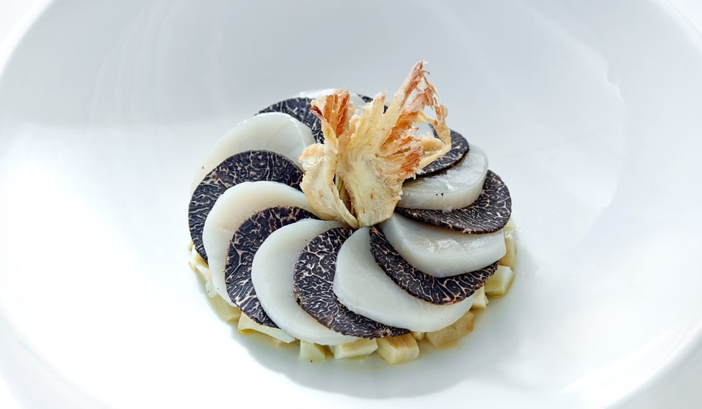 Warm sliced scallop on a bed of baby artichoke and black truffle at Gaddi’s in Tsim Sha Tsui. Photo: Peninsula Hong Kong