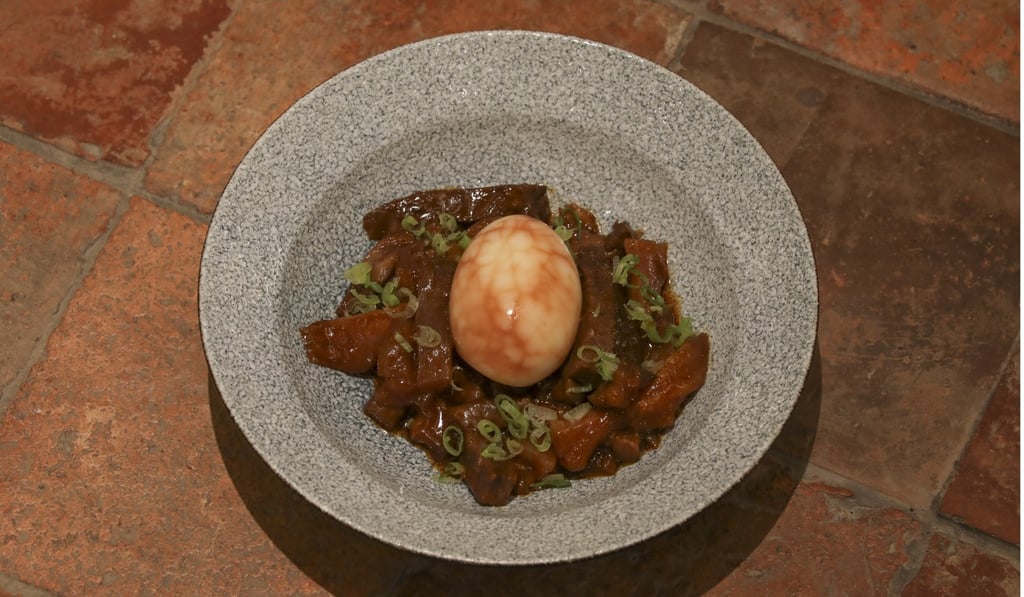Beef tendon with soft smoked tea egg. Photo: Antony Dickson