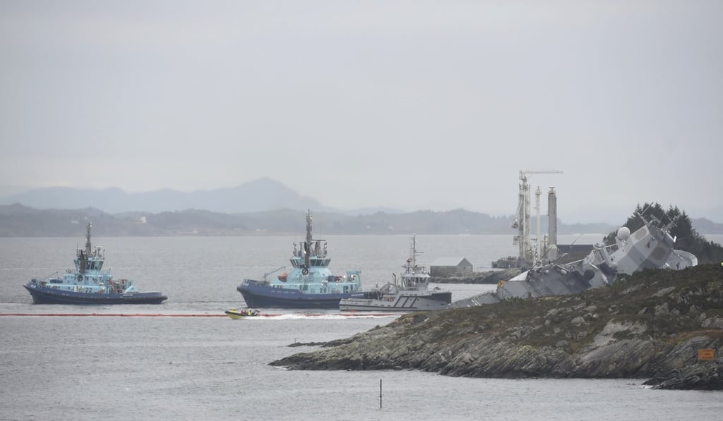The Norwegian frigate KNM Helge Ingstad, right, after a collision with the tanker Sola TS. Photo: AP