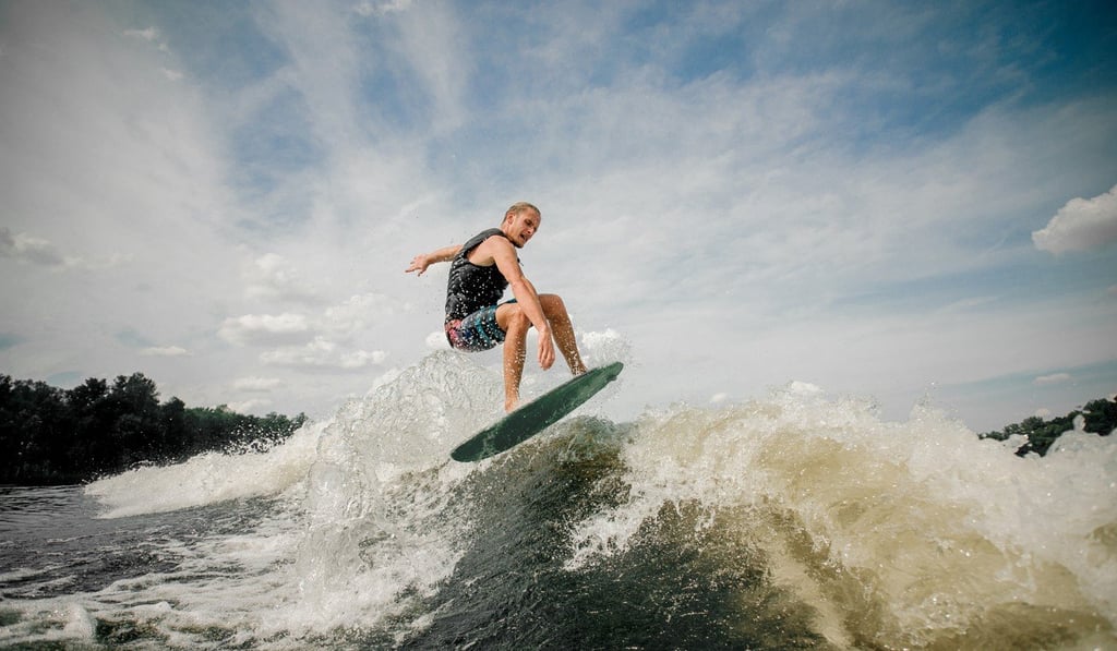 Wakesurfing allows you to ride the wake from a speedboat. Photo: Shutterstock